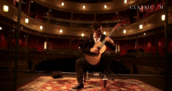 Milos performing on stage at Bristol Old Vic
